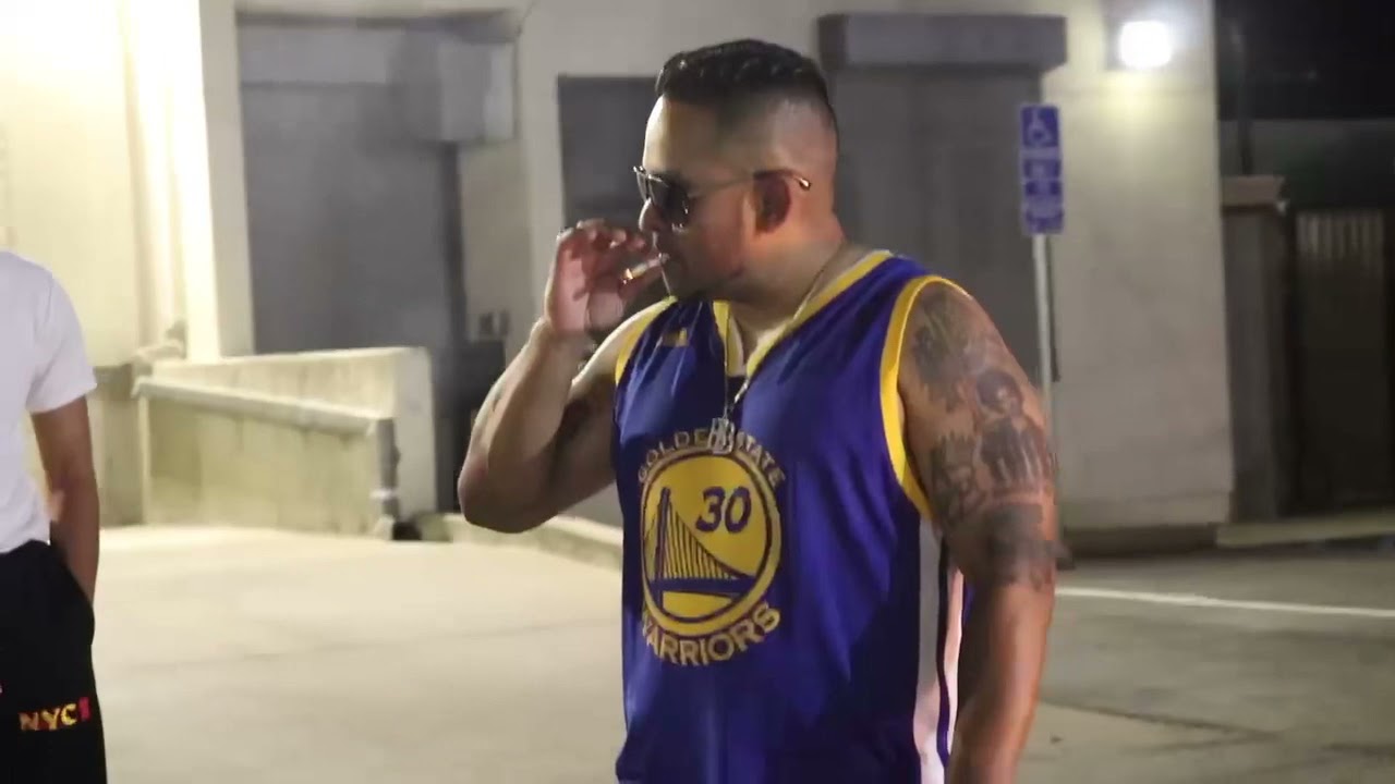 Bully Wiz taking a smoke break after a dope sideshow