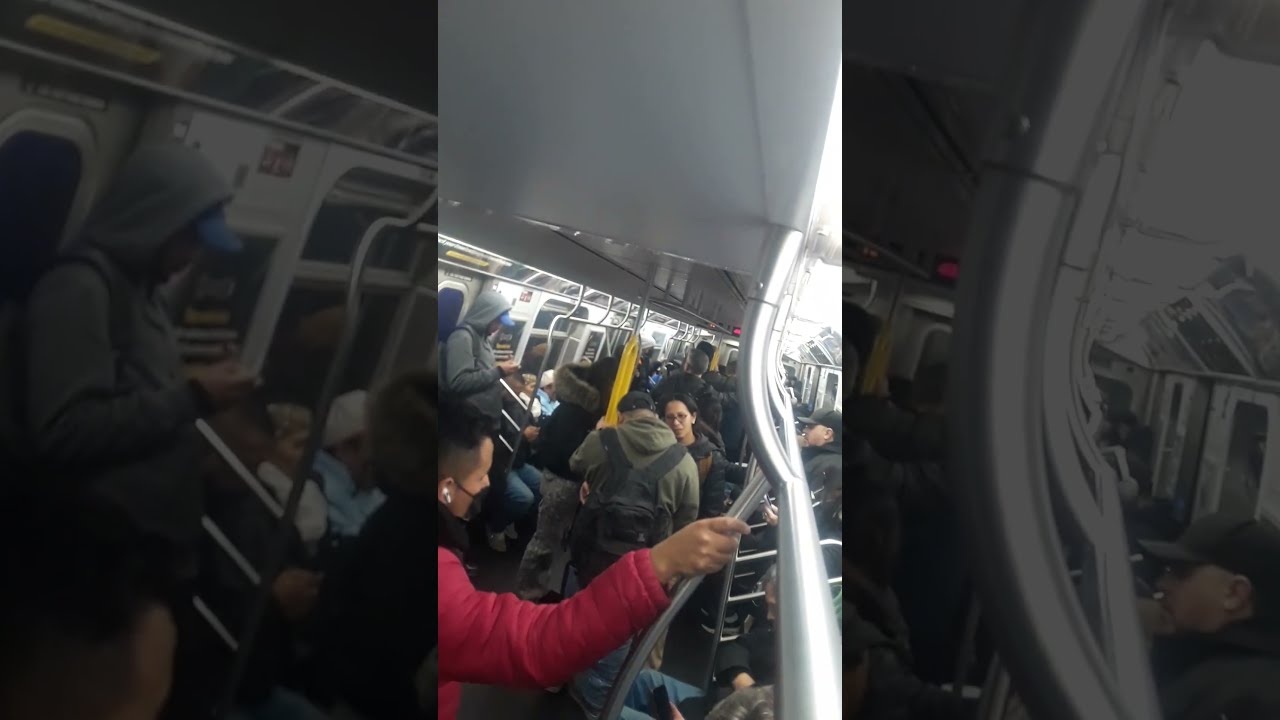 Riding The Forest Hills Bound "M" Train During Evening Rush  