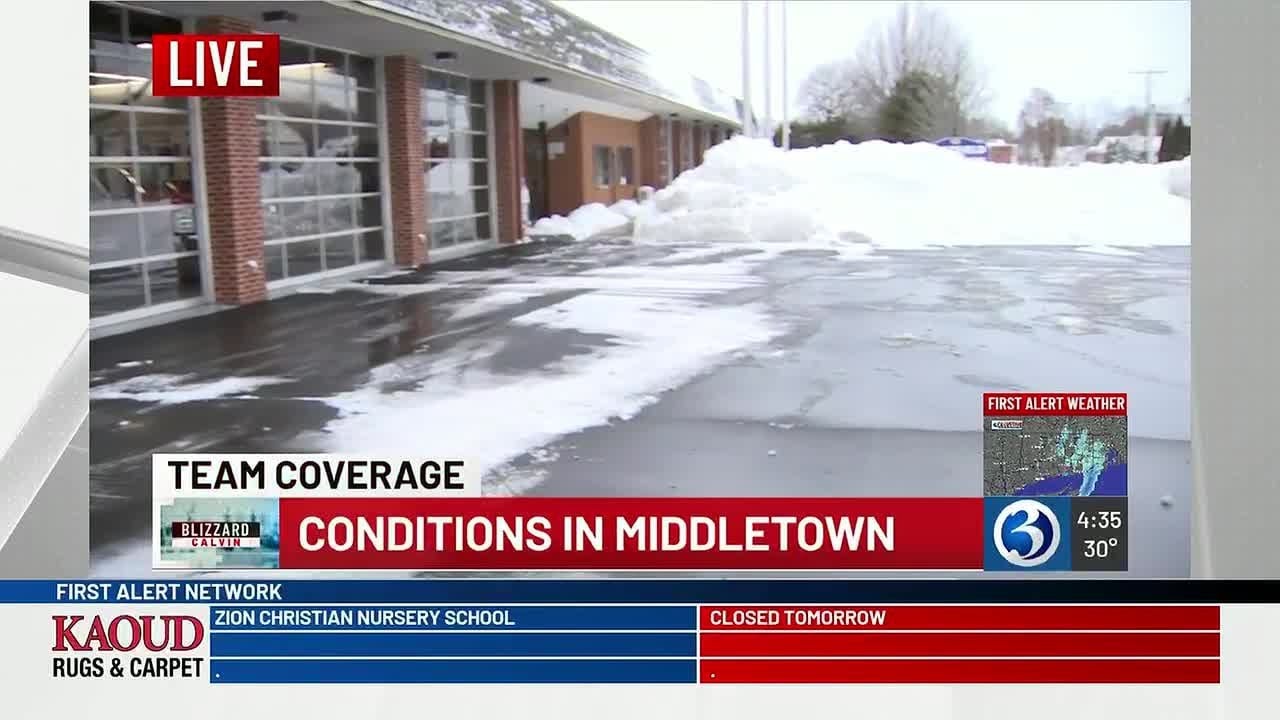 Crews work to clear snow in Middletown