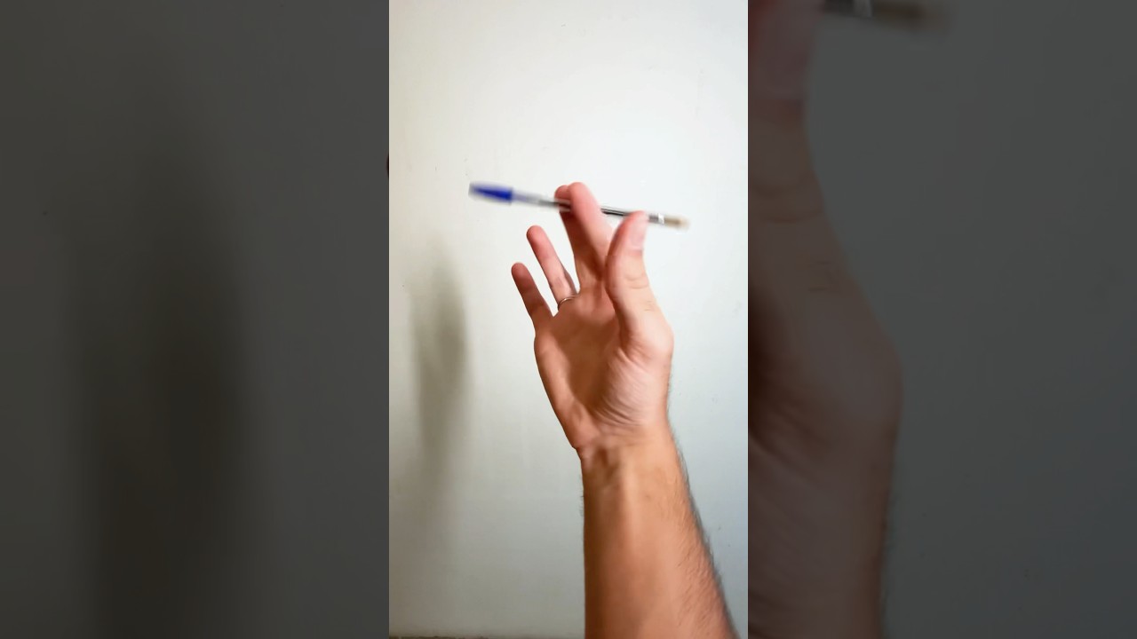 como girar uma caneta na mão