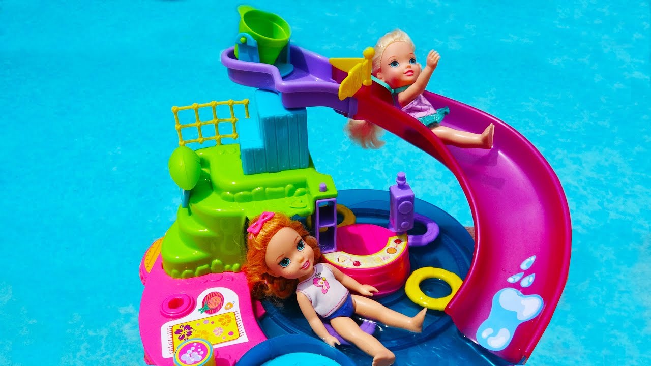 Elsa and Anna toddlers at the water park