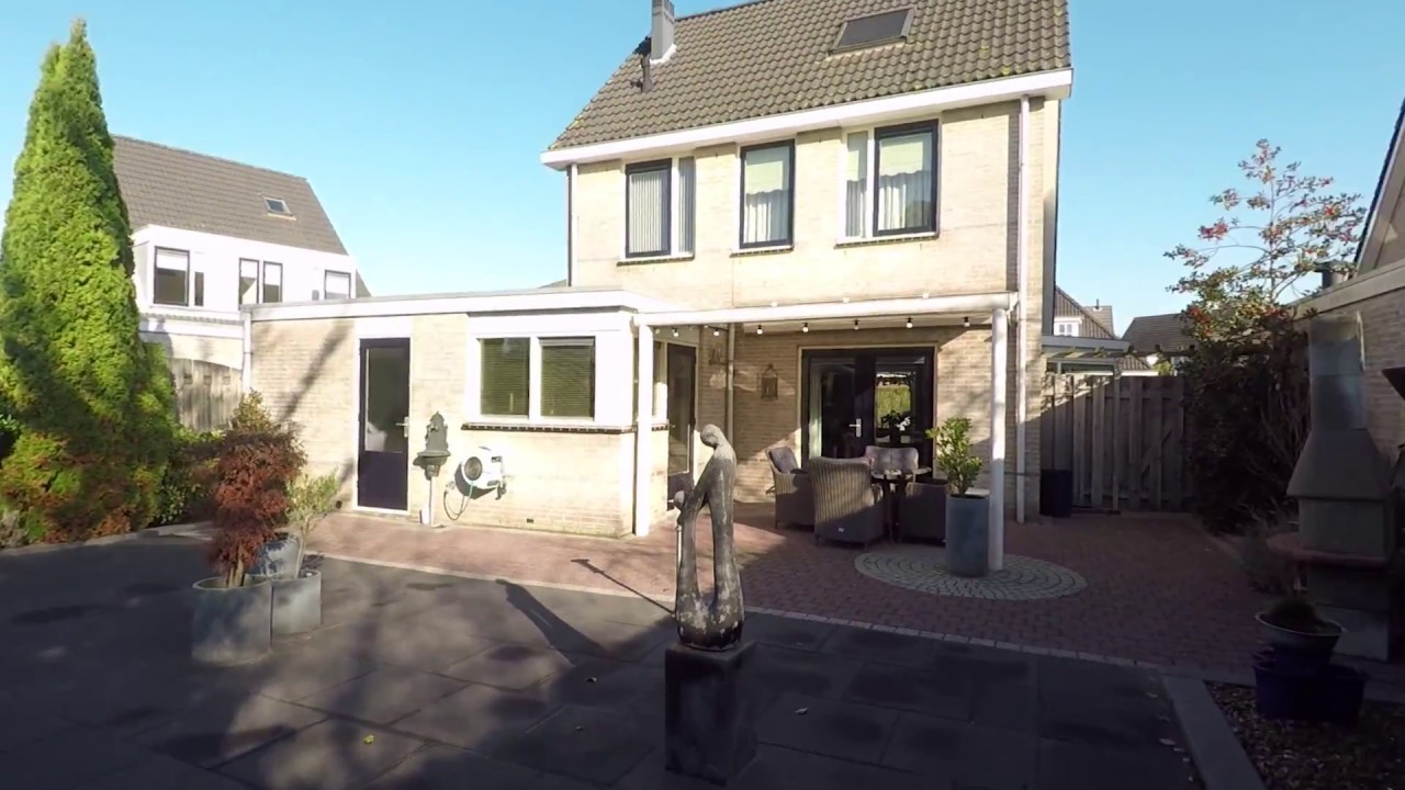 Vrijstaand wonen met grote tuin en garage in Beesd!