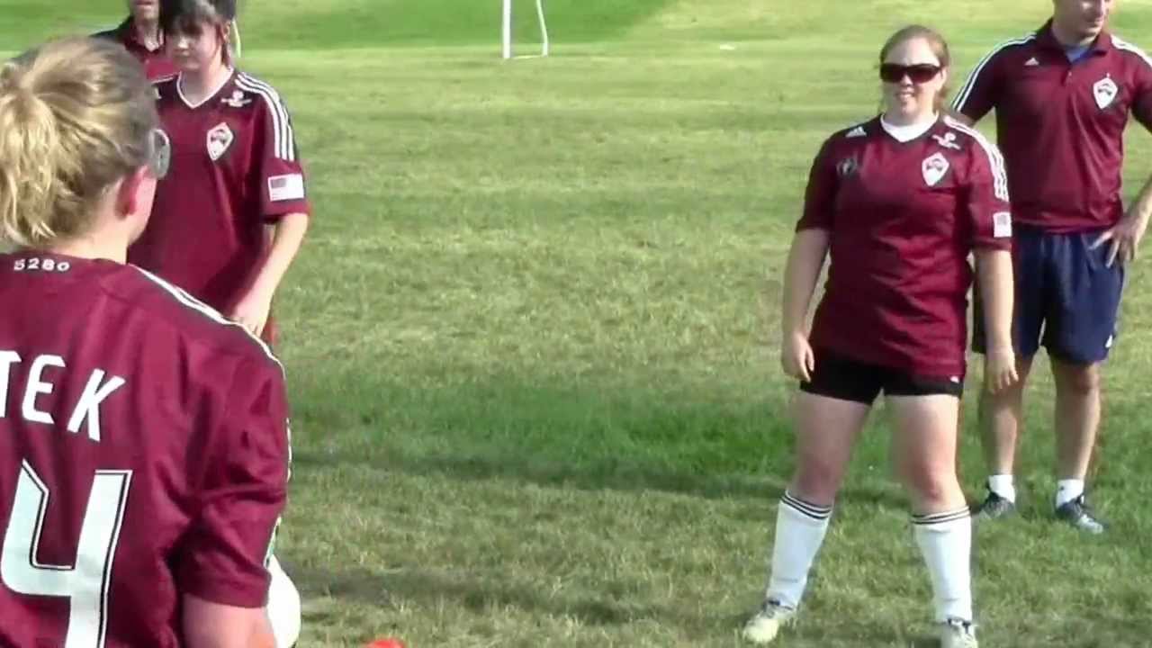 Colorado Rapids assisting Special Olympics soccer team with drills