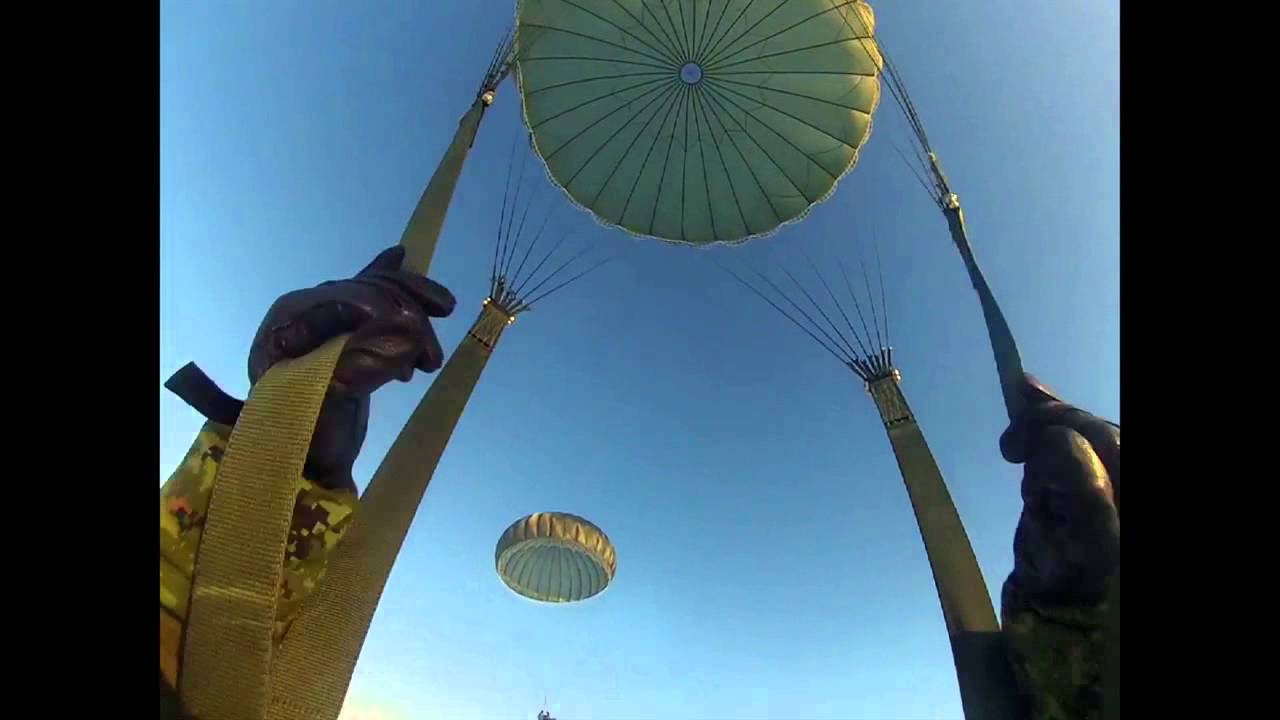 Paratroopers drop into Kugaaruk