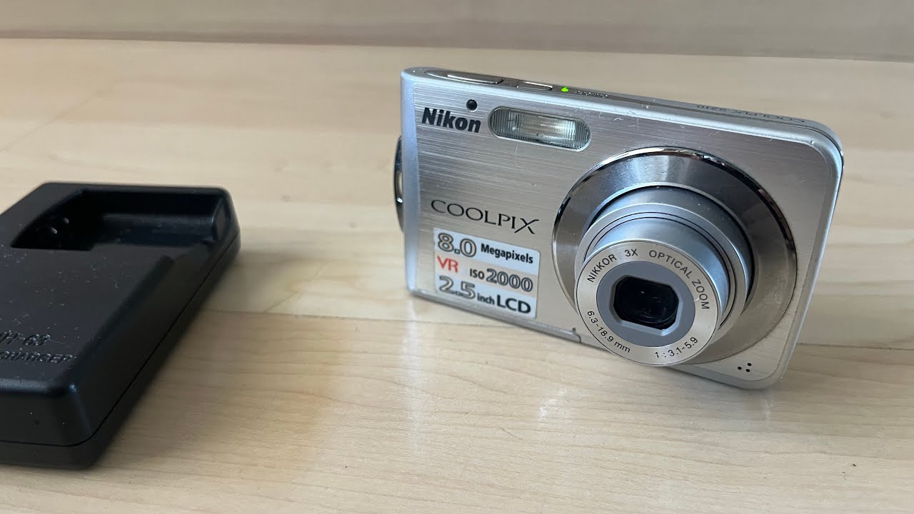 Nikon Coolpix S210 8.0 MPx zoom lens old digital camera photo shoot device retro charger test