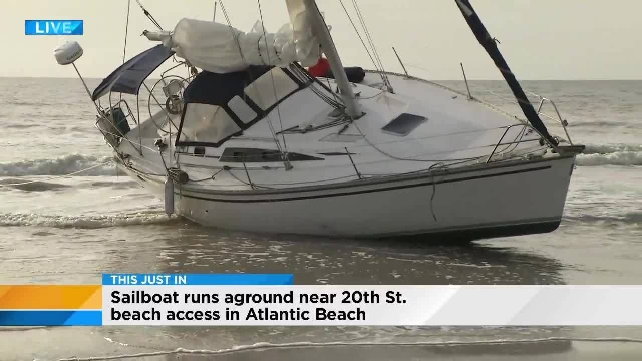 Sailboat runs aground