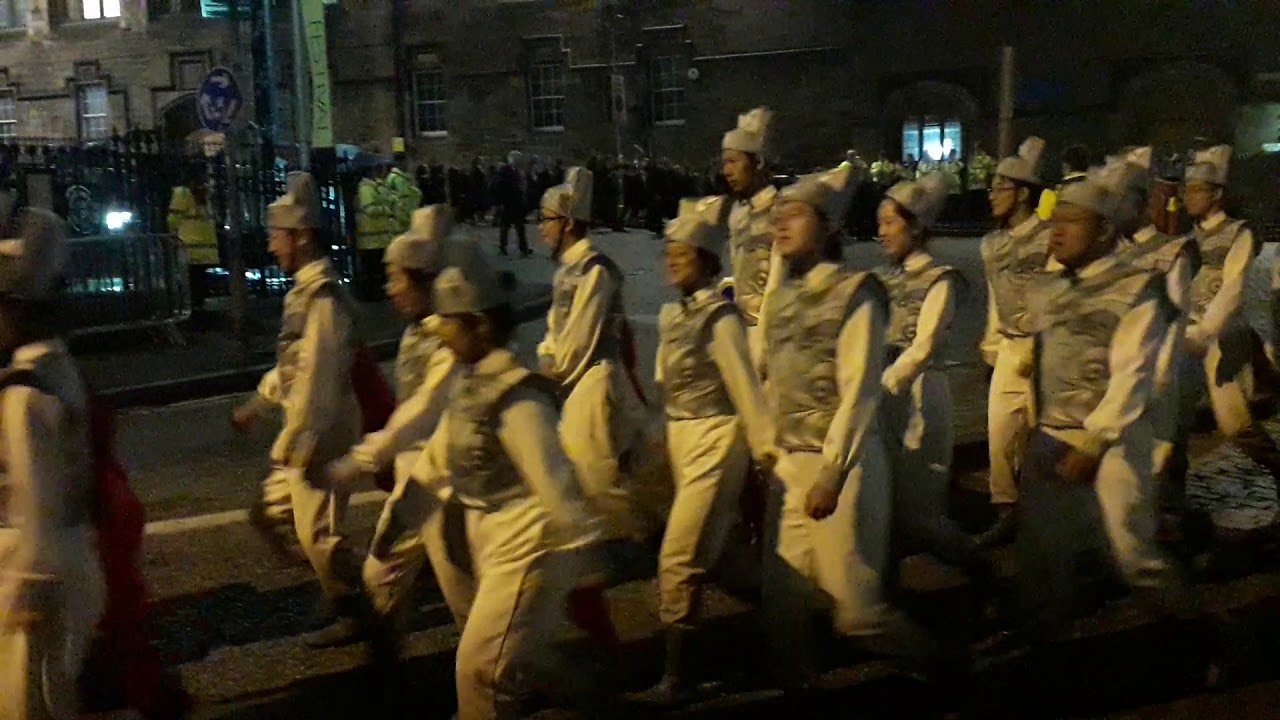 Edinburgh Military Tattoo massed pipes and drums leaving the castle