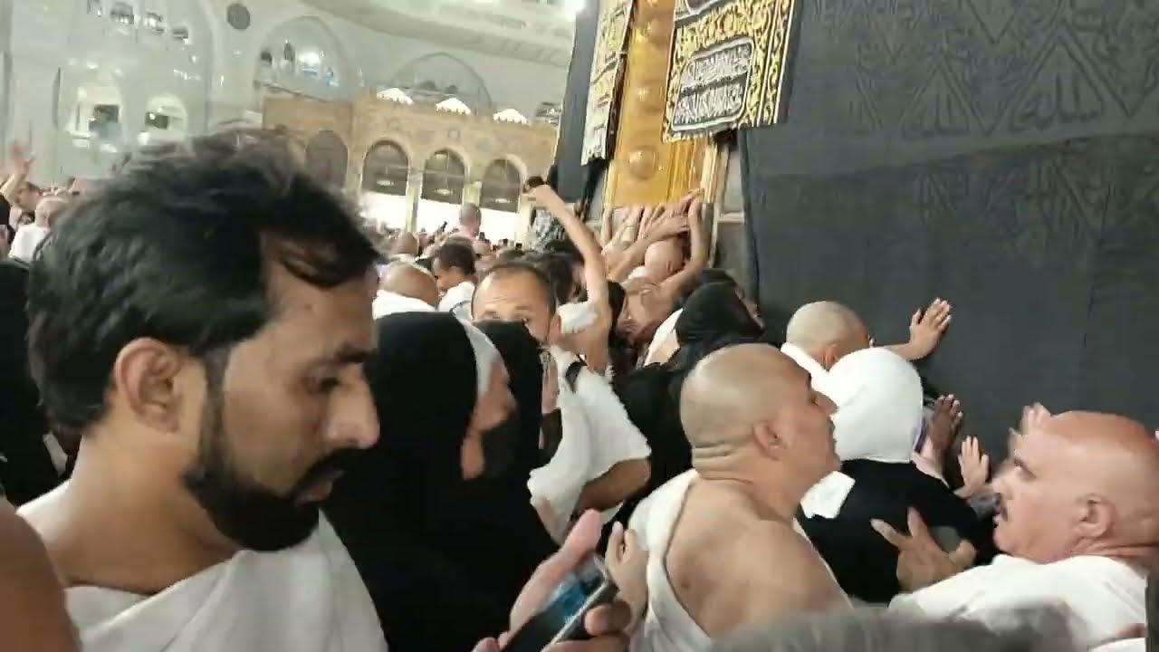 Umrah Pilgrimage  while performing this umrah tawaf  they are encouraged to touch the Black Stone