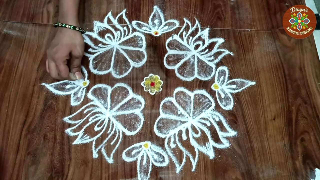 Try this beautiful and simple rangoli design at home! #rangoli #muggulu #kolam 