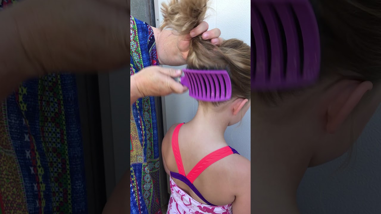 The Happy Hair Brush being used on 5 day unwashed beach hair
