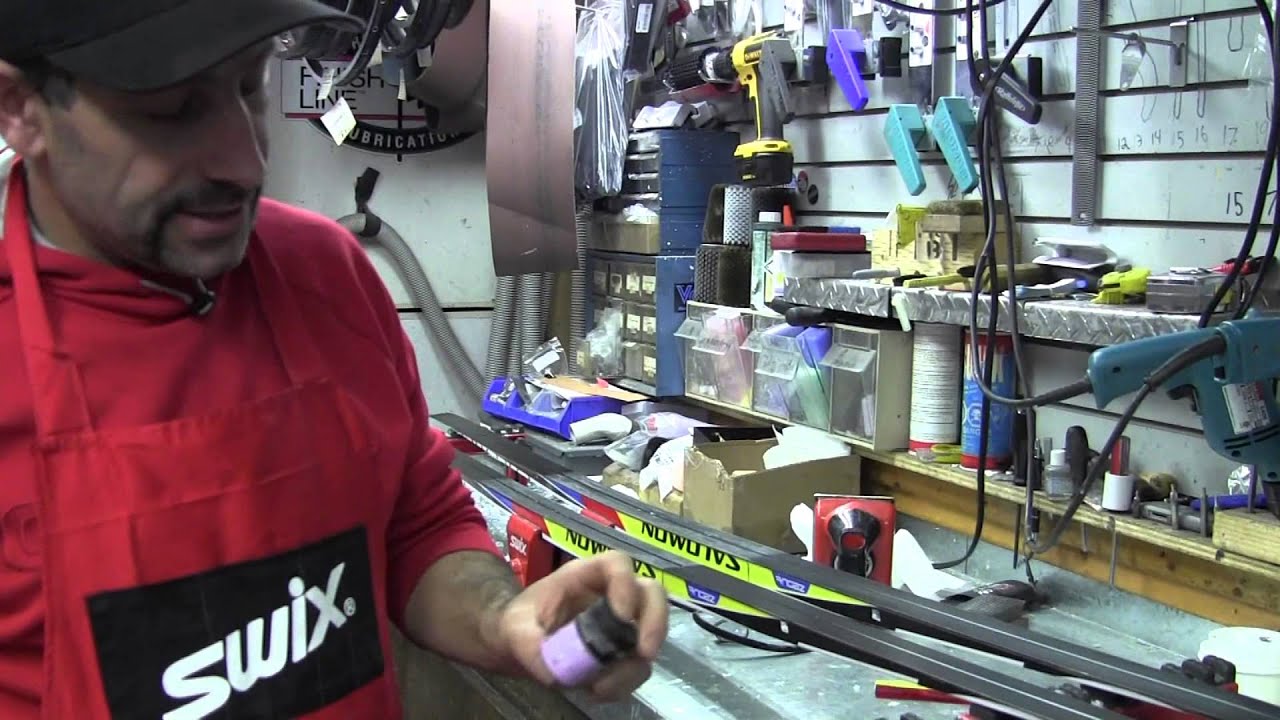 McBike demonstrates how to apply grip wax to XC skis