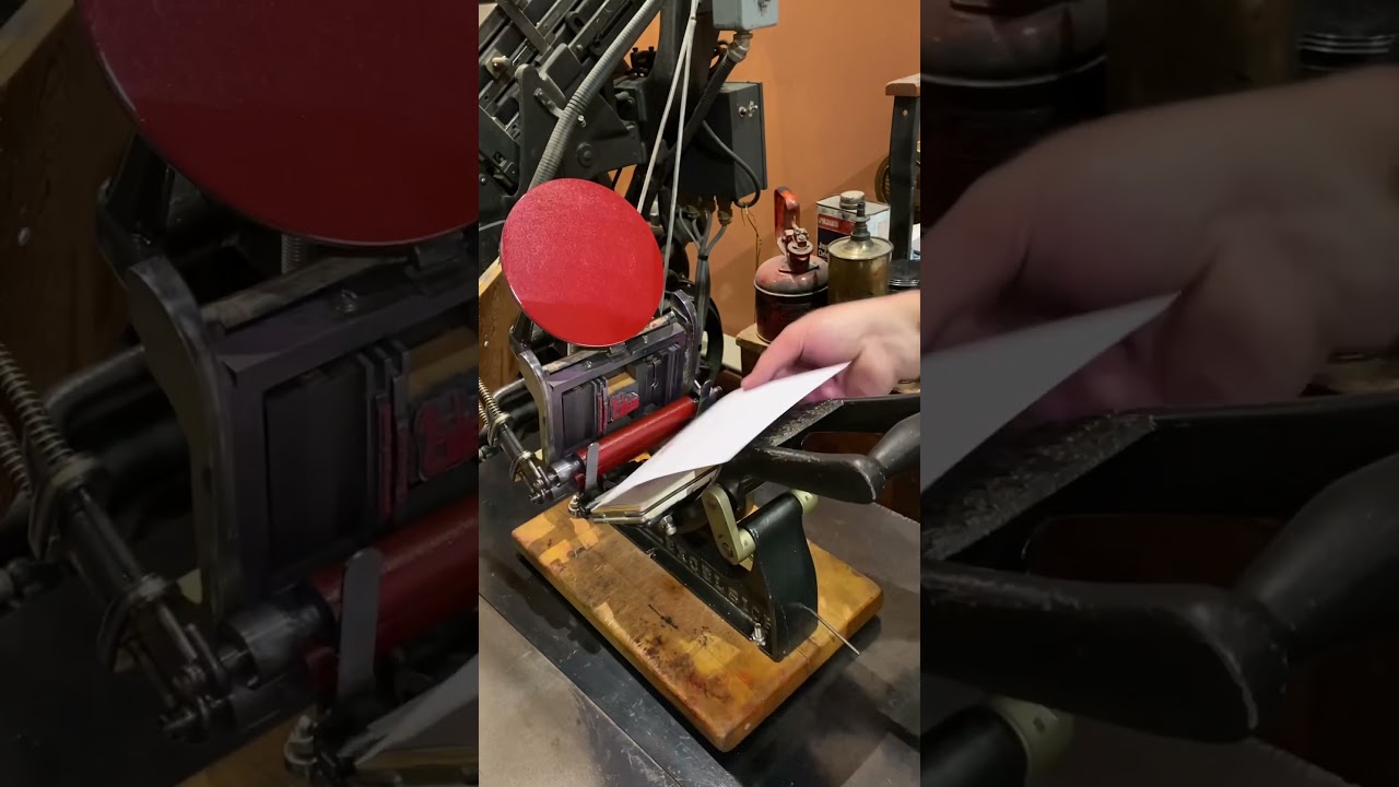 Printing some red 🍎 greeting cards with a tabletop printing press