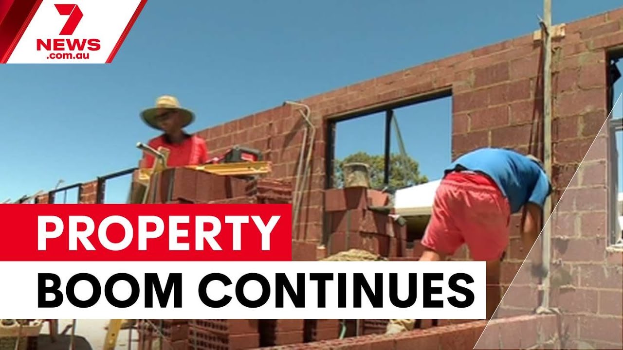 Property prices surge despite rate rise fears | 7NEWS