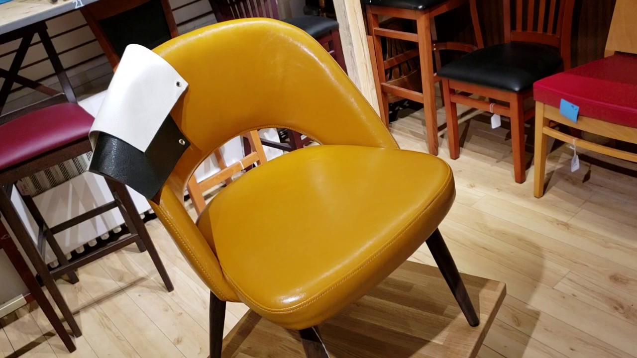 The Baltimore Restaurant Chair Orange Vinyl With Wood Grain Metal Legs - TableBaseDepot.com