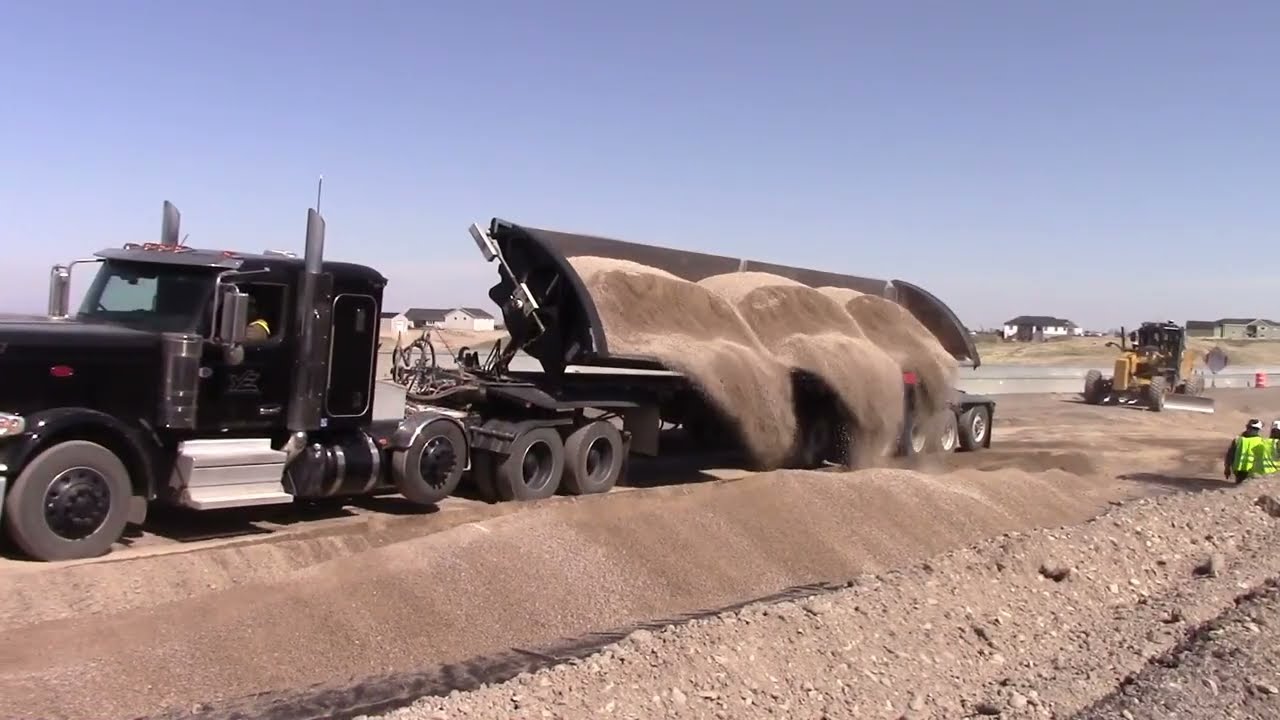 Yount Enterprises Loves Working Their SmithCo Side Dump Trailers Hard in Idaho