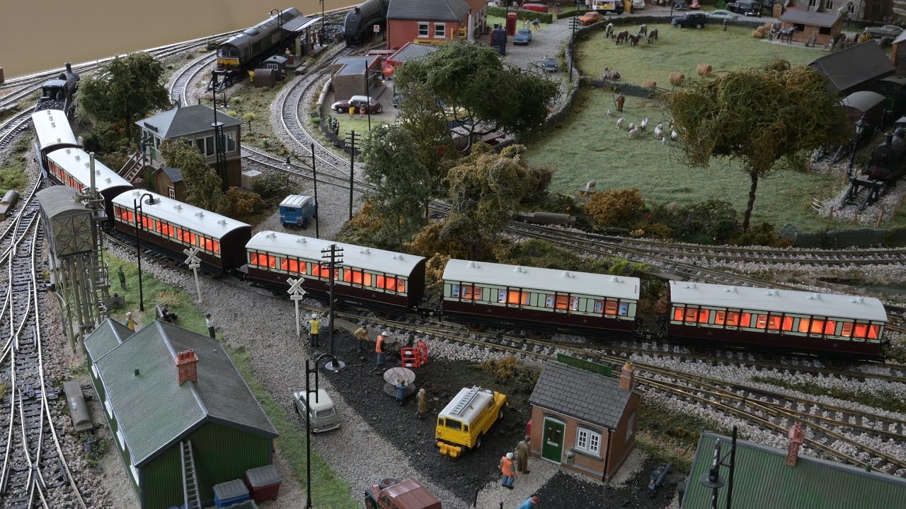 Hornby LNWR 6 wheel carriages being pulled by a J36 called Maude.