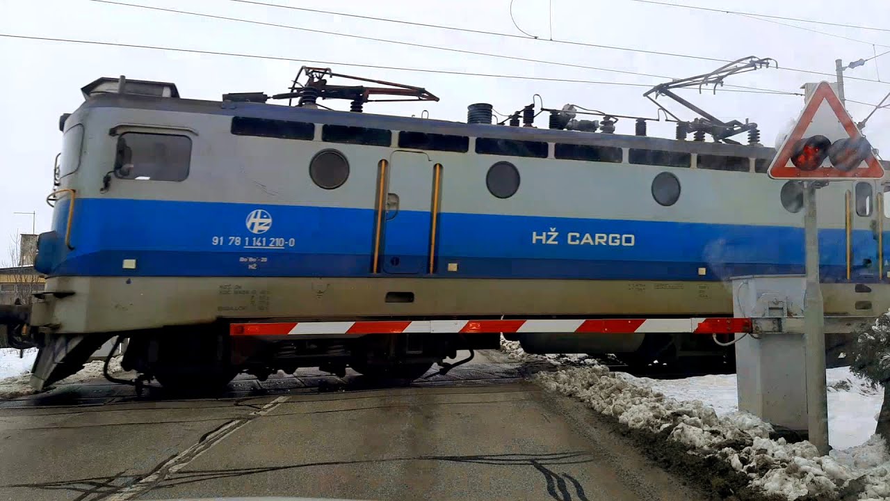Trains at a railway crossing in Croatia