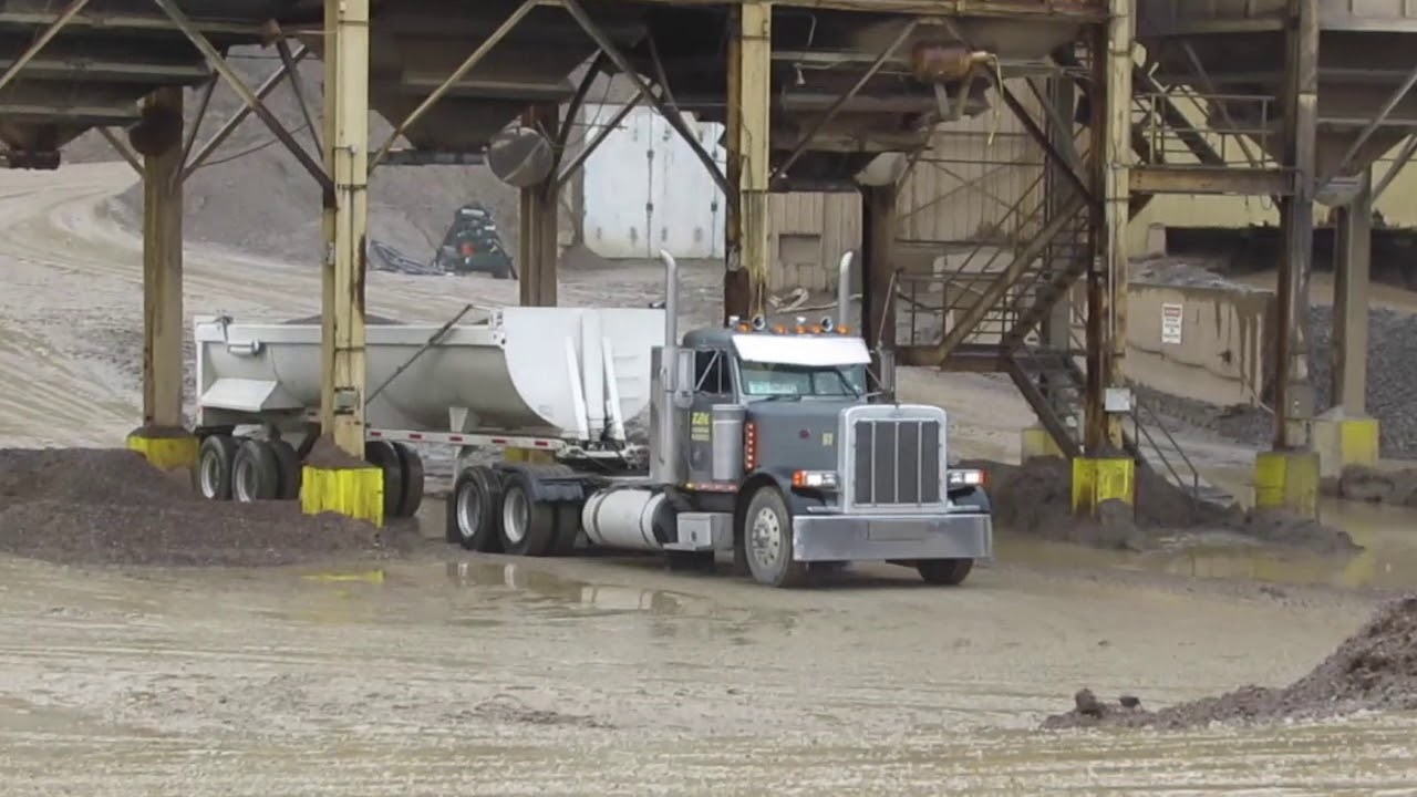 Customer trucks load at bins at Morrison Quarry