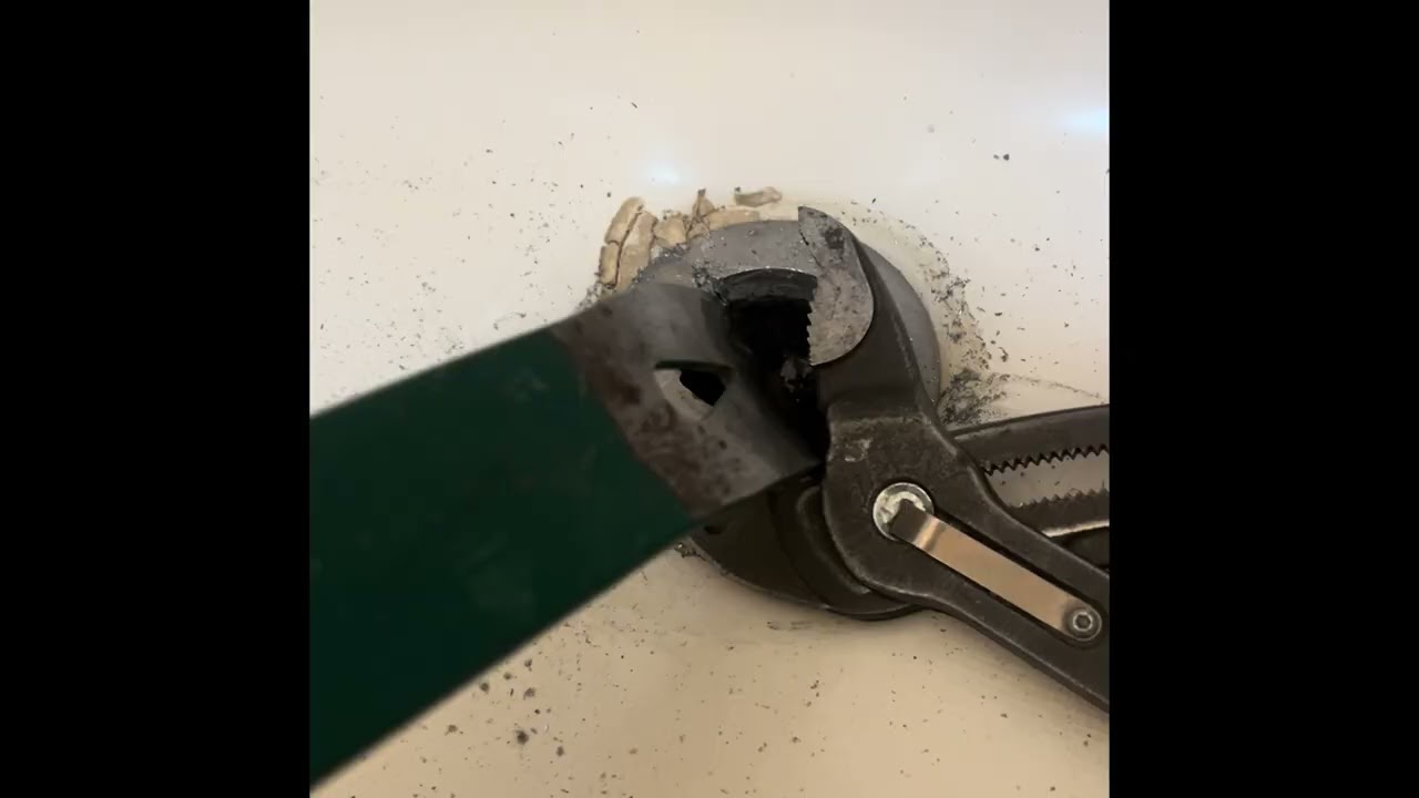 How to remove a tub drain with no crossbars 