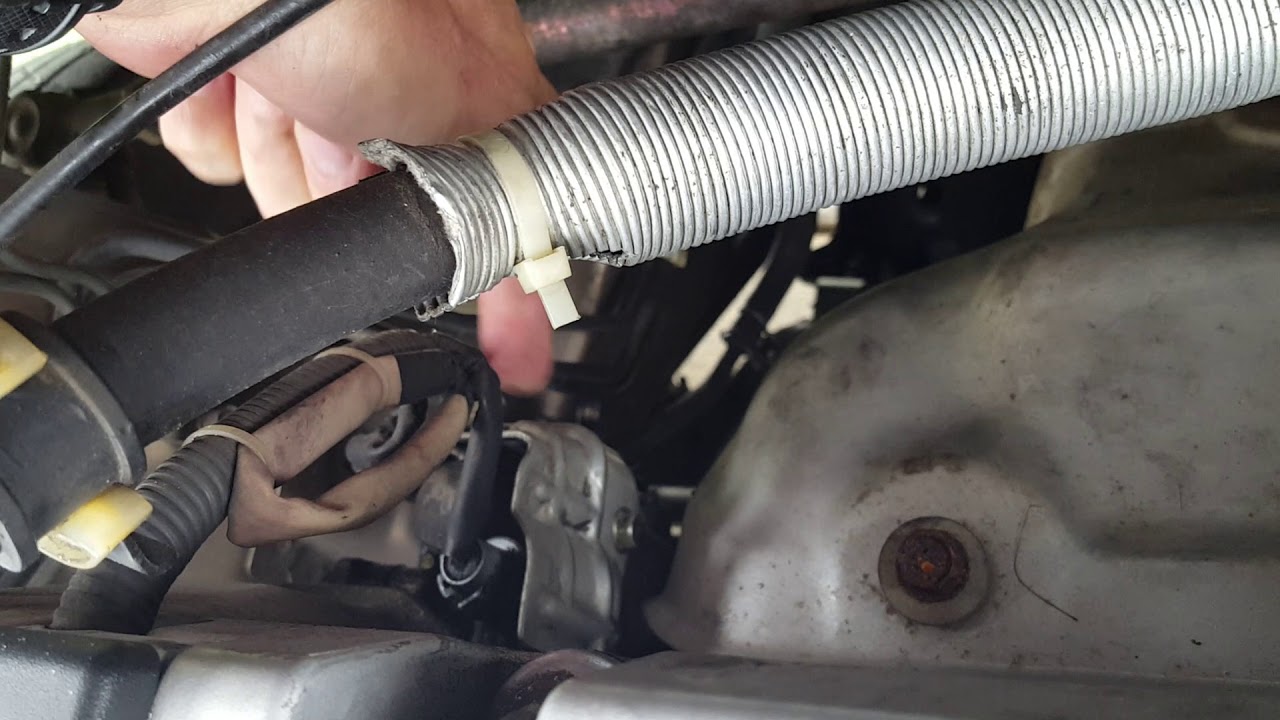 Утечка масла в Honda CRV VTEC 2002-2006 годов выпуска.