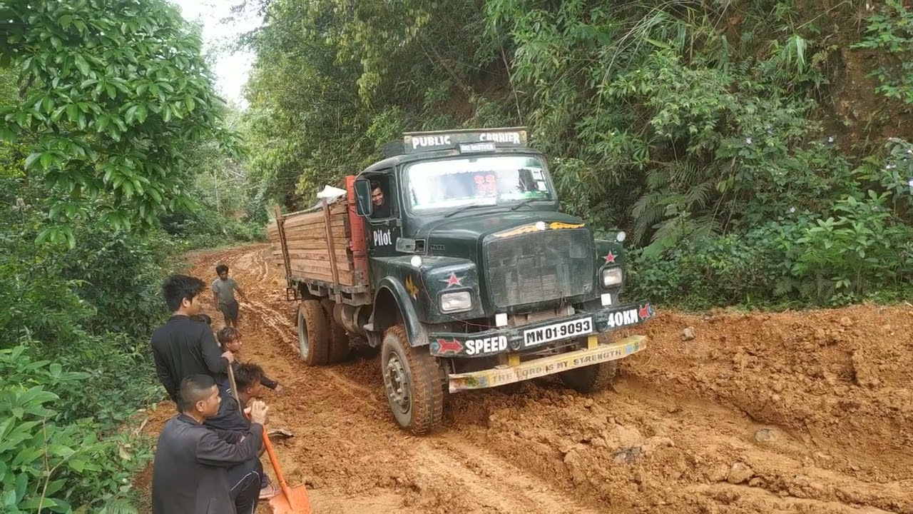 tata monster 4x4 climbing slippery road with full load