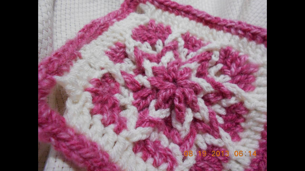 Cuadro tejido de la orilla al centro