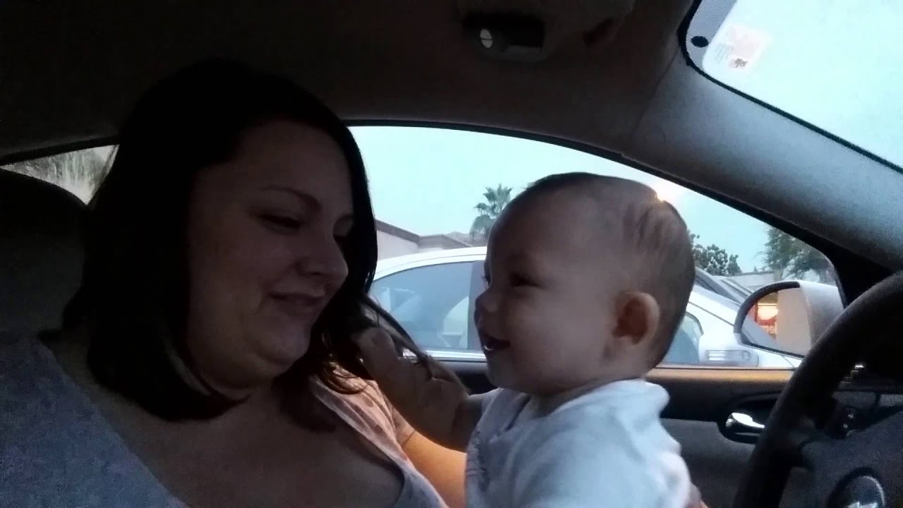 Giggling from kiss attack