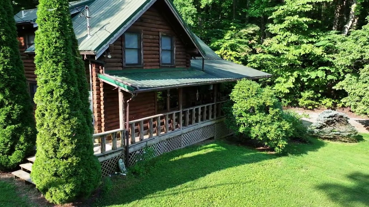 Price: $799,000 ( Temp off market) .Log Cabin on 17 acres For Sale in East TN!!