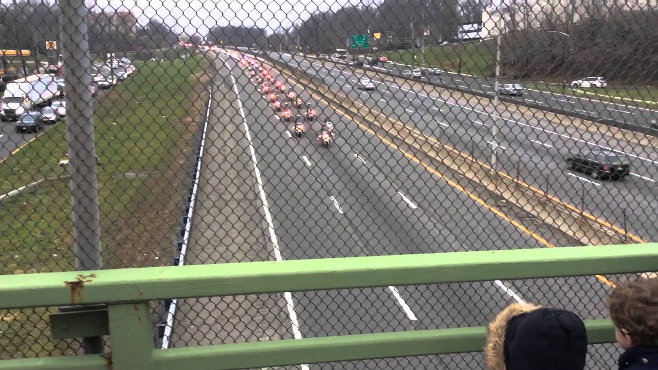 Yonkers Police and residents salute to NYPD Det. Lemm funeral procession.