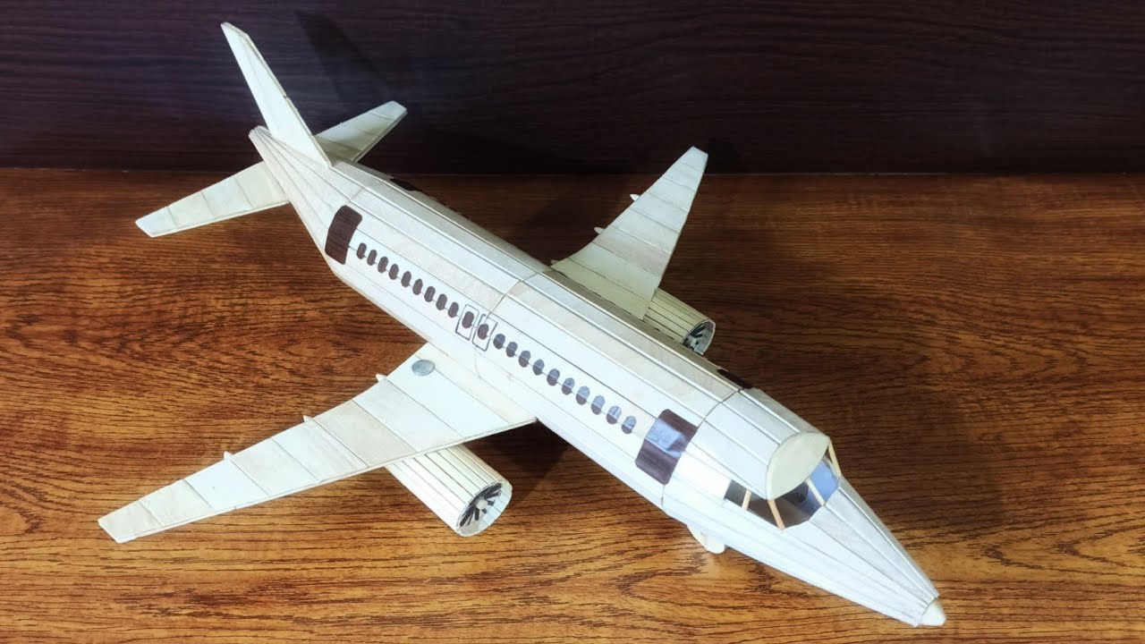 Como hacer un avion con palitos de helado - How to make an airplane by popsicle stick ice cream