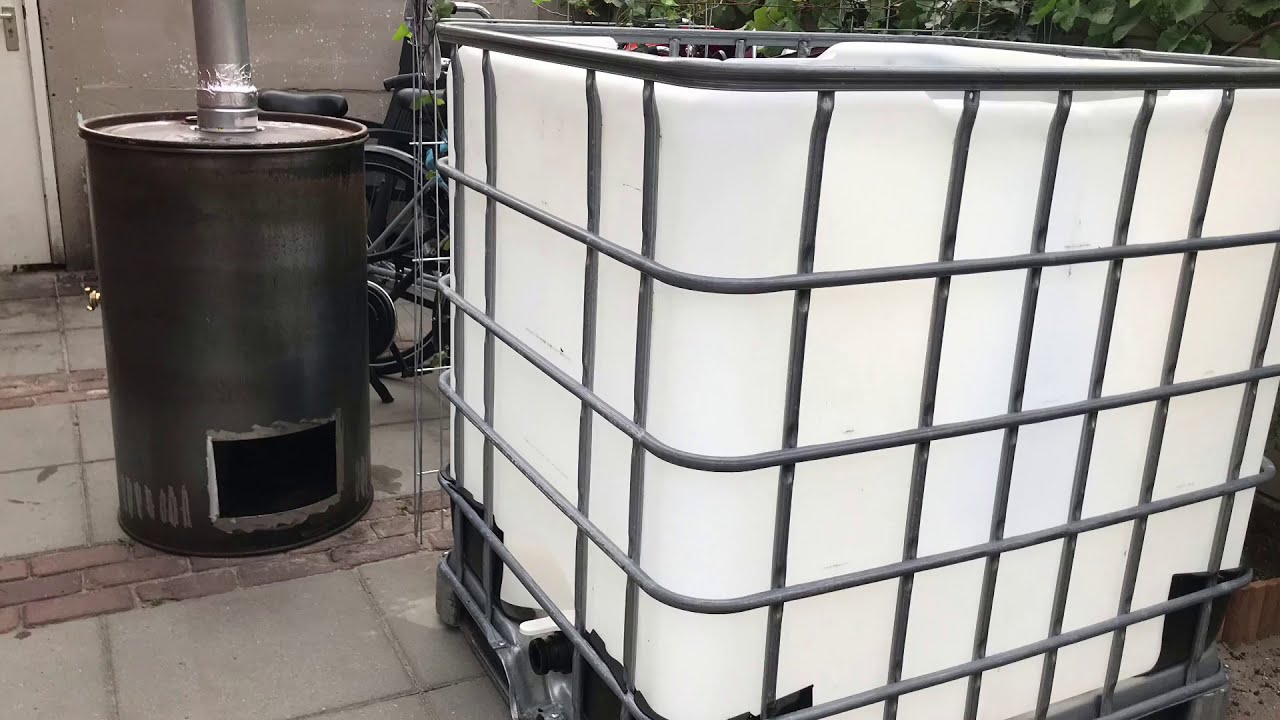 Diy Ibc hottub project fire wood heater, heatexchanger homemade jacuzzi off grid