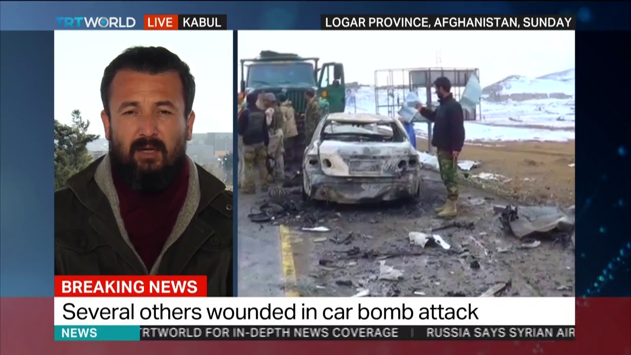 Afghan Taliban kill at least 12 in car bomb attack on military base