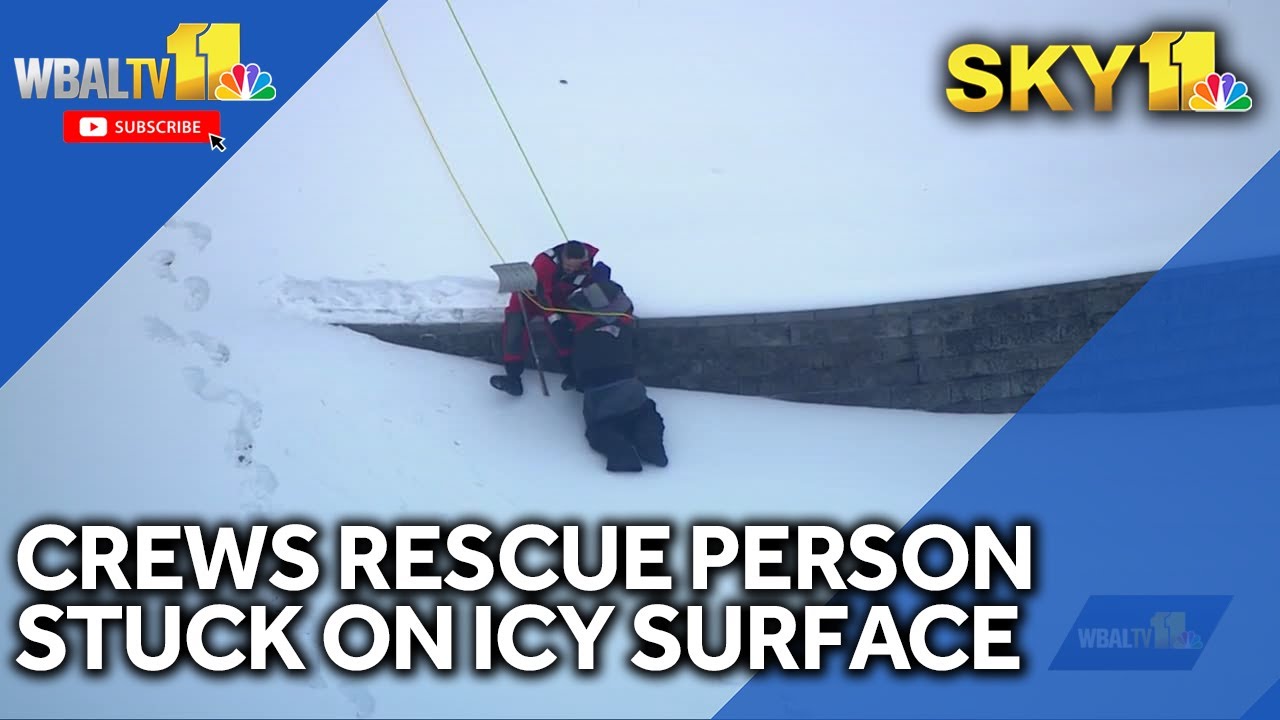 SKY 11: Rescuers pull person from slippery hill