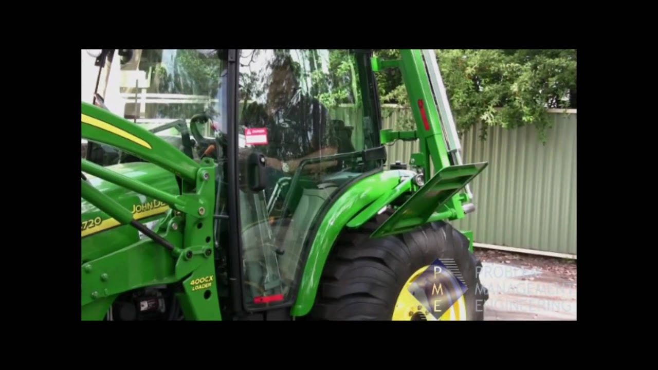 PME Tractor transfer lift for wheelchair user access