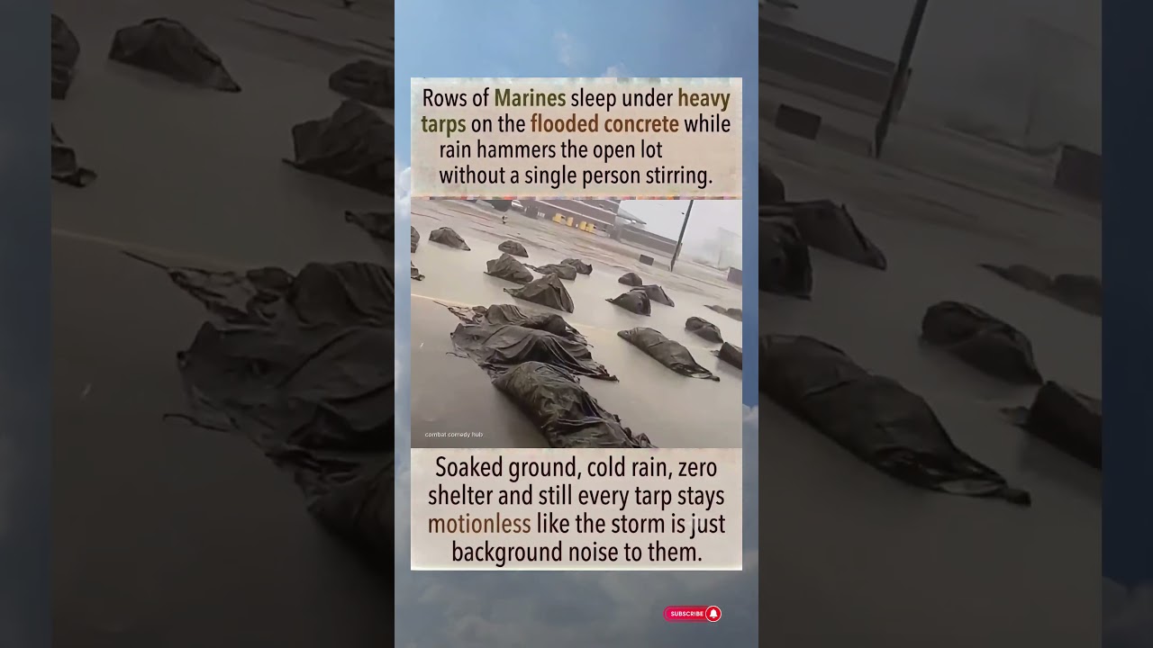 Rows of Marines sleep under heavy tarps on the flooded concrete while rain hammers #shorts