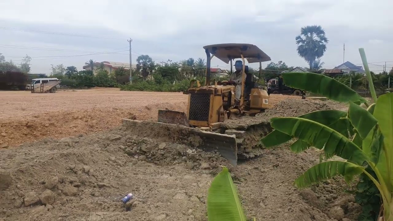 Strong Dozer Mitsubishi BD2F Hard working filling land.