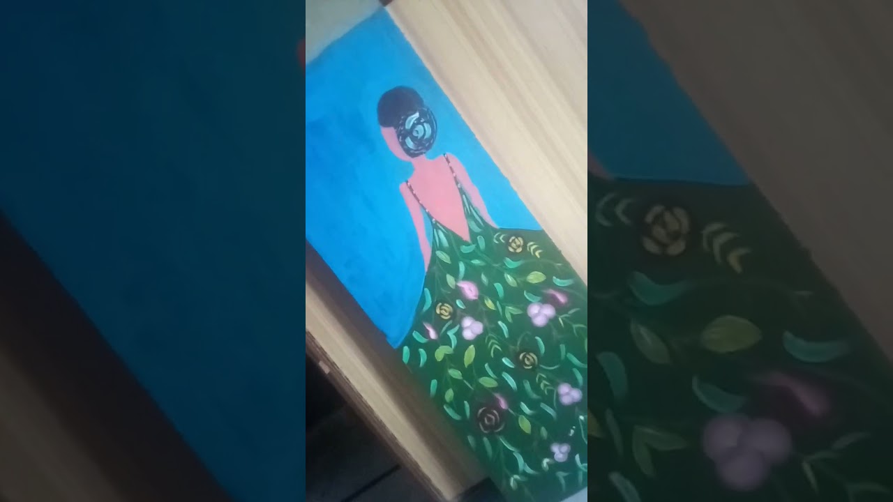 painting of doll on wood        