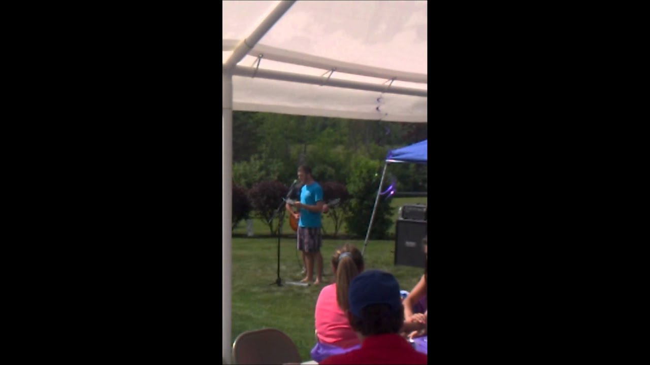 Josh Muzzi singing at his grad party...
