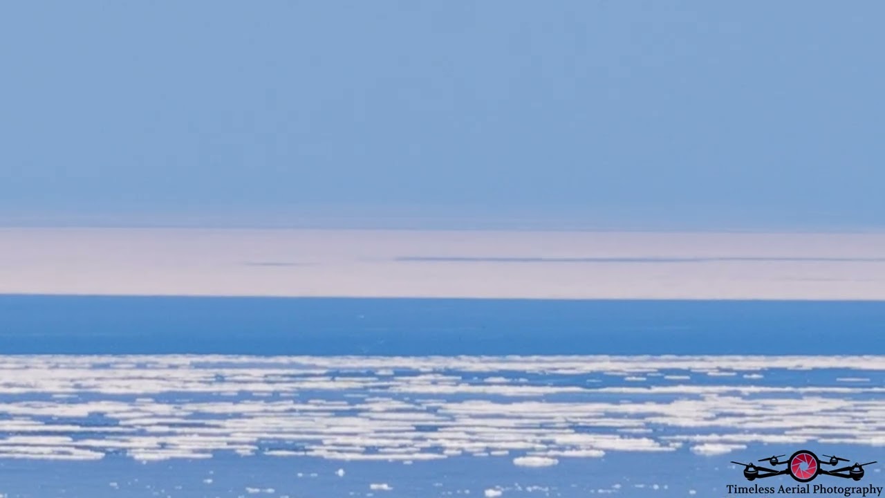 Zooming In On Ice Patches On Lake Michigan Off The Coast Of Michigan City 6K Drone Footage