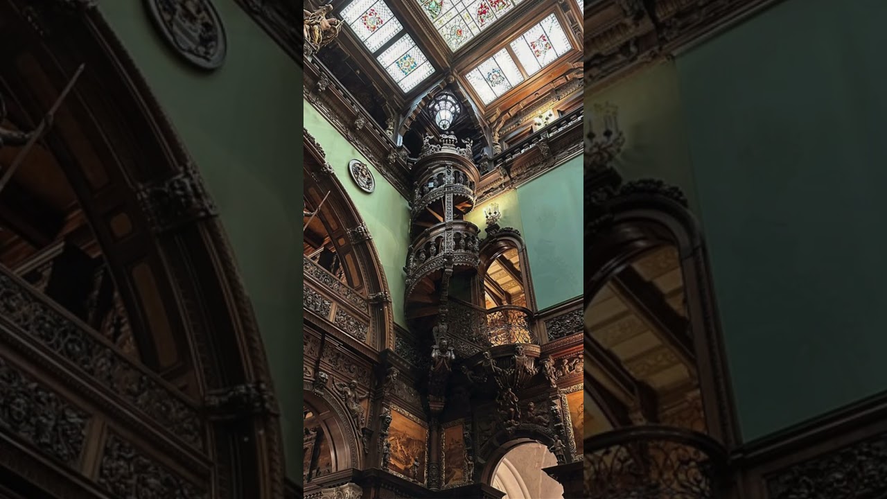 The famous wooden spiral staircase of Peles Castle in Sinaia