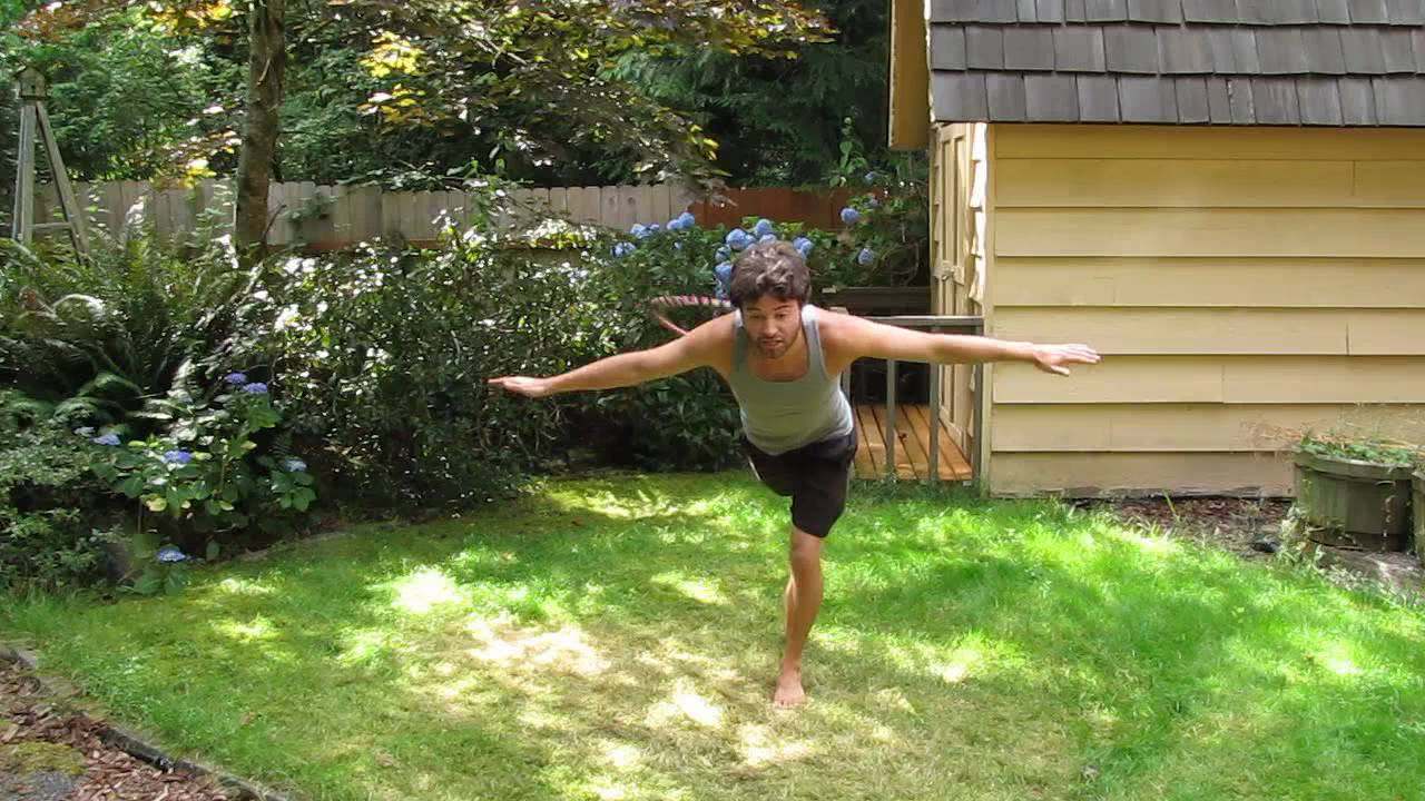 How to Hula Hoop Tricks: Foot Hooping Lasso Above Back Bent Over