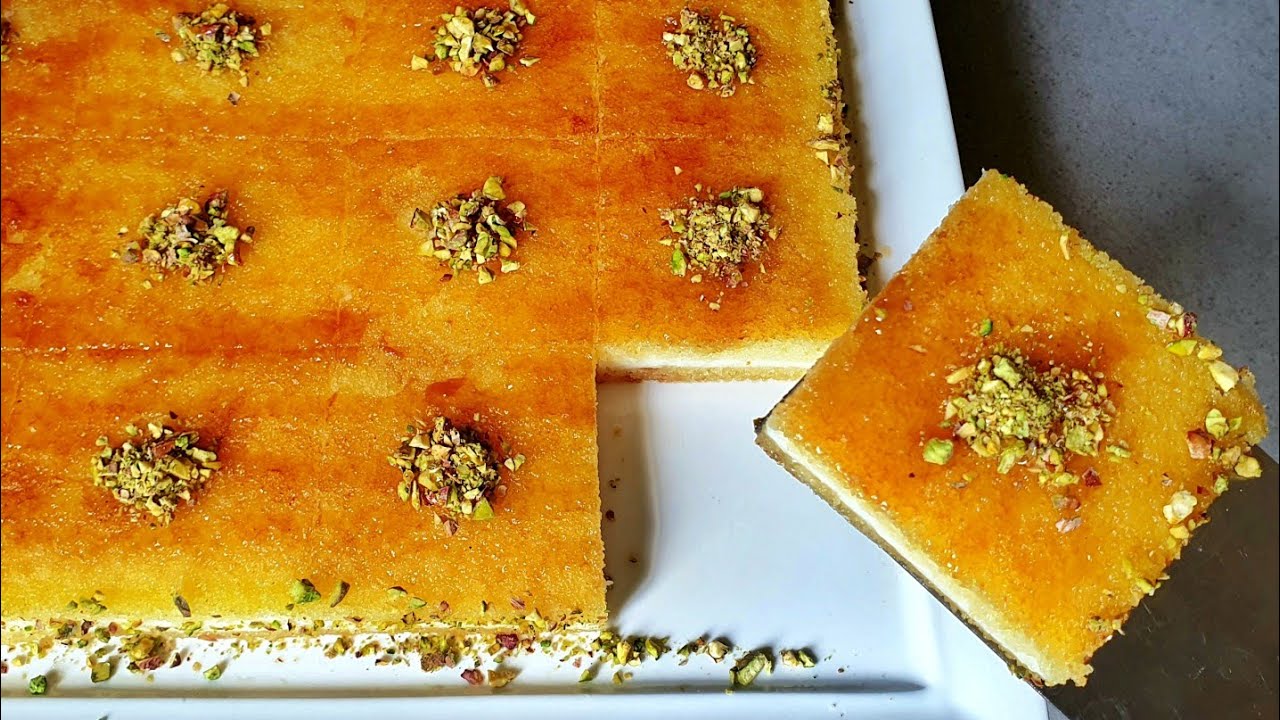 بسبوسة في دقائق كذوووب فالفم بحجم عائلي بمكونات بسييييطة وبحشوة اروع منها مكاينش 😍
