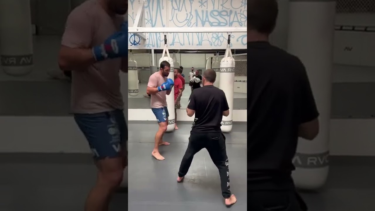 Luke Rockhold back cracking pads with Jason Parillo