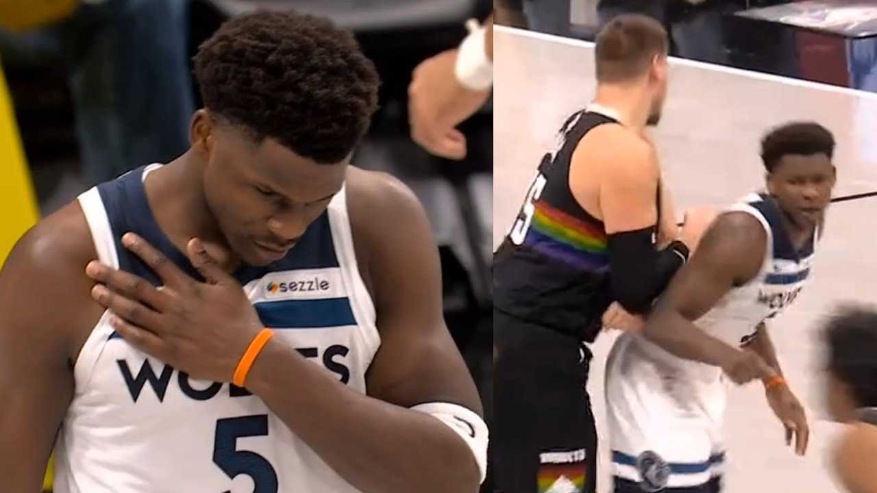 Anthony Edwards hurts shoulder after fall then again on a Nikola Jokic screen