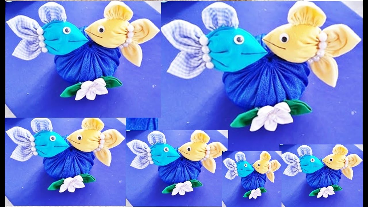PEIXINHOS FEITO DE FUXICO/PESO DE PORTA
