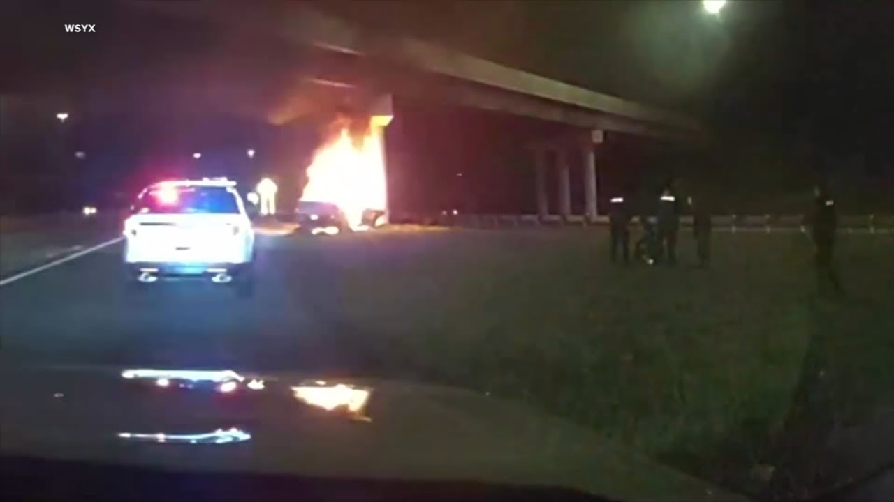 "Tell my wife I love her": Rookie officer rescues man from burning truck