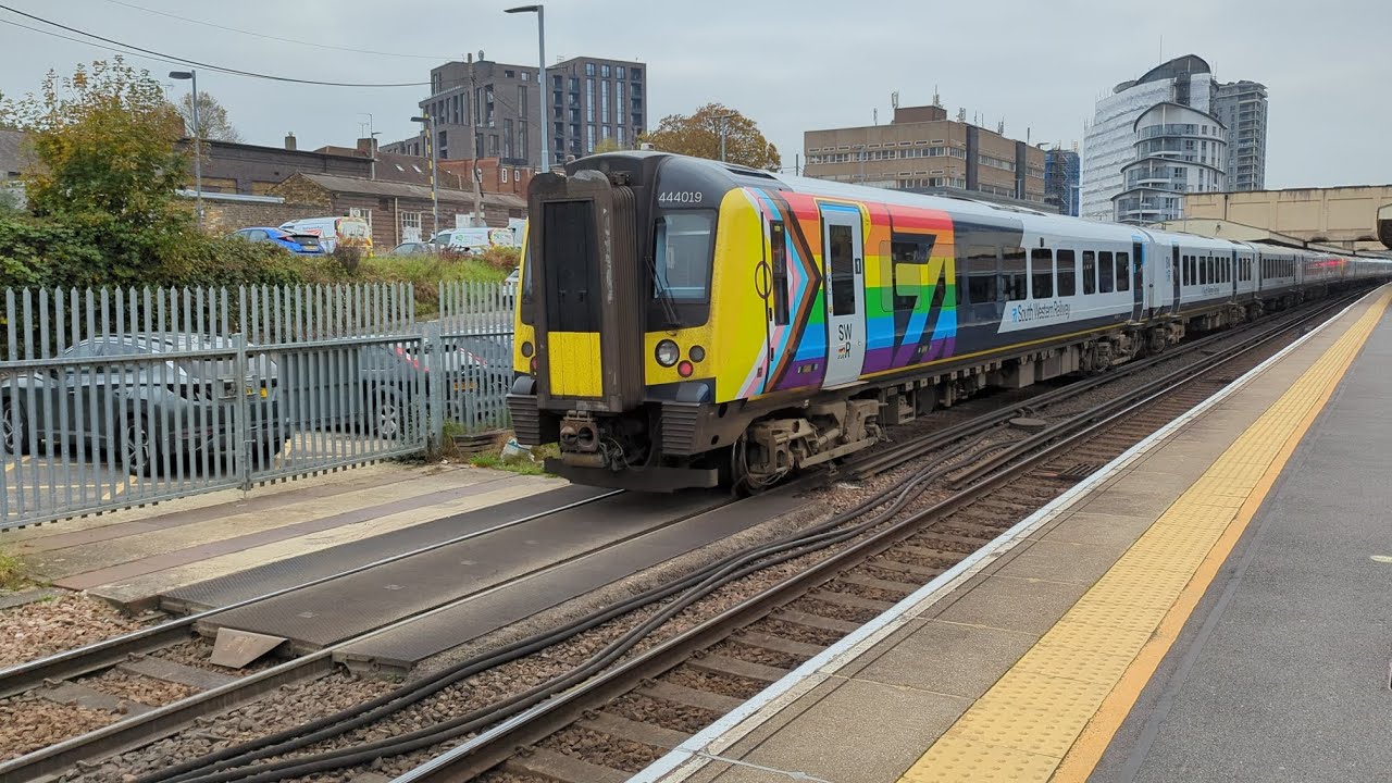 Trains in Woking on the very busy South Western Mainline.