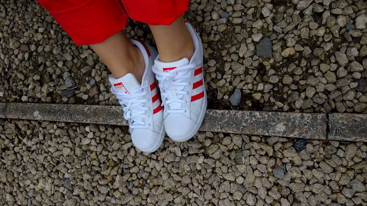 Adidas Superstars shoeplay and her sockless feet