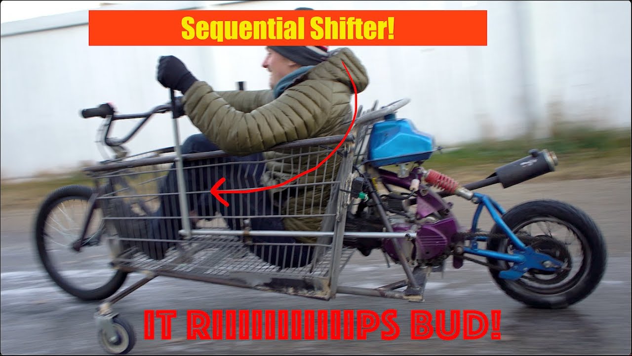 We built a sHoPPinG cART mOtOrcyCle!  (with training wheels cuz our b*lls haven't dropped yet)