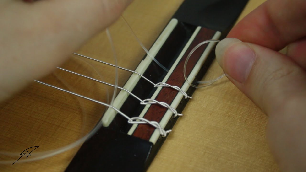 Neue Saiten f&uuml;r die Gitarre - einfacher Saitenwechsel f&uuml;r Anf&auml;nger